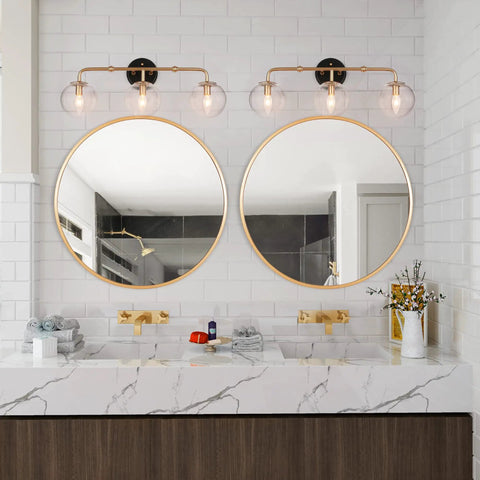 Black And Gold Three Light Vanity Light Fixture With Seeded Glass Shades And Black Backplate For Modern Bathrooms Over Vanity Mirror