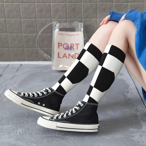 Black And White Piano Grid Thigh High Socks Unisex Breathable Moisture Wicking Crew Socks For Women Men displayed with black sneakers.