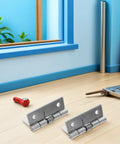 Hardcore Stainless Steel Self Closing Hinges Rock Solid Spring Loaded Door Hardware, shown on wooden floor with tools