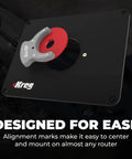 Heavy Duty Phenolic Router Table Insert Plate Fits Triton MOF001 And TRA001 Routers with alignment rings on a workbench.