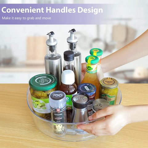 Hands rotating 4 Pack 11.5 Inch Clear Lazy Susan Organizer With 360 Degree Turntable Raised Edge And Handles on countertop.