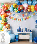 Premium Ten Pack Of Heavy Duty Spring Clips Measuring 3.5 Inches Featuring Transparent Plastic Build holding balloons in a colorful arch.
