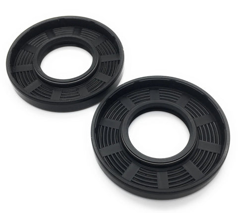 Two black double‑lip oil seals, TC style rotary shaft seals, 25×52×7 mm (front view)