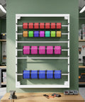 6 Rod Wall Mounted Wire Spool Rack Adjustable Cable Organizer For Garage Workshop Save Space Easy Install with colorful cords.