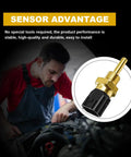 Coolant temperature sensor with brass body and black connector; mechanic at engine bay in background.