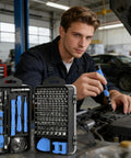 Man using the 115-In-1 Precision Screwdriver Set With Magnetic Bits Clutch Head Non Slip Ergonomic Handle Tweezers for auto repair, kit in foreground.