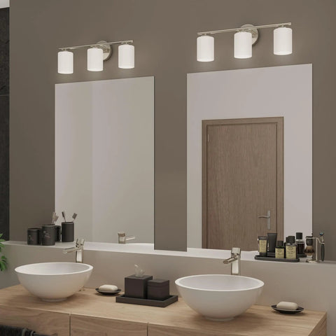 Three Light Etched White Glass Modern Bath Vanity Light With Brushed Nickel Finish in bathroom setting