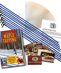No Sweat Maple Syrup Tapping Kit For Trees with blue drop tubes, instruction booklet, and recipe cards.