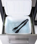 Ice cooler drawer with tongs in the Large 48 Inch Stainless Steel Outdoor Kitchen Island On Wheels With Ceramic Top