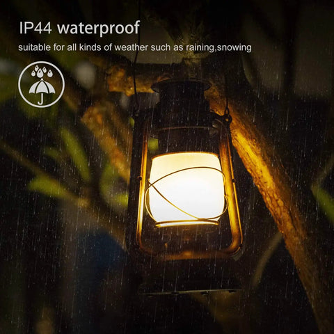 Battery Operated LED Vintage Lanterns With Remote, Rustic Outdoor Decor With Realistic Flickering Flame in rainy outdoor setting