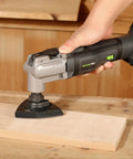 Badass 20V Cordless Oscillating Multi Tool With 15 Piece Accessory Kit And Rapid Charge Lithium Battery For Demolition And Precision Detail Work A True Job Site Beast To Buy Today in use on wood.
