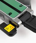 MultiVolt 36V Sliding Miter Saw detail showing adjustment lever and foot pedal for precise control