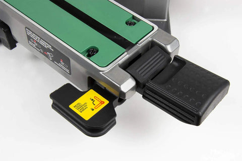 MultiVolt 36V Sliding Miter Saw detail showing adjustment lever and foot pedal for precise control