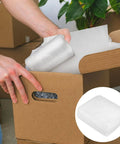Person using 100 Pcs White EPE Foam Packing Bags Soft Cushioning Sleeves For Fragile Items And Glassware Protection in cardboard box