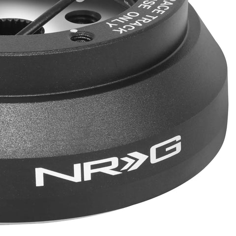 Close-up view of TopRated Racing Steering Wheel Quick Release Short Hub Adapter with 6X70mm bolt pattern and black finish.