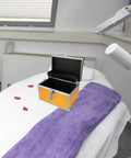 Built Tough Aluminum Tool Box With Secure Lock And Heavy Duty Handle For Mechanics And Field Pros on a treatment table.