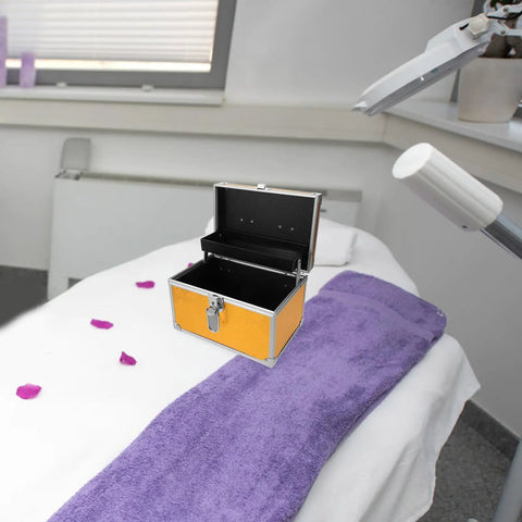 Built Tough Aluminum Tool Box With Secure Lock And Heavy Duty Handle For Mechanics And Field Pros on a treatment table.
