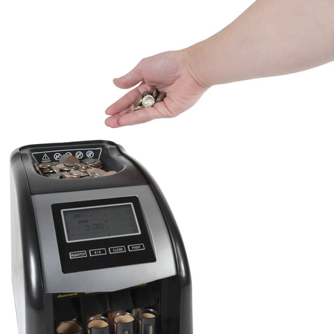 Hand sorting coins into 4 Row Electric Coin Counter And Sorter With No Fuss Auto Row Advancement And Anti Jam Technology And Digital Counting Display.