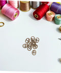Mini Alloy Belt Buckles Set For Doll Clothes And Tiny Belts, 150 Pcs Small Single Prong Fasteners in sewing setting.