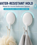 Heavy Duty Adhesive Wall Hooks For Bathroom And Kitchen No Drill Strong Sticky Hangers For Towels Coats Zero Hassle Residue Free 4 Pack on wet wall.