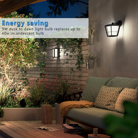Dusk To Dawn Outdoor LED Light Bulbs 2 Pack 5000K Daylight 720 Lumens 9W 60W Equivalent A19 E26 on patio wall at night