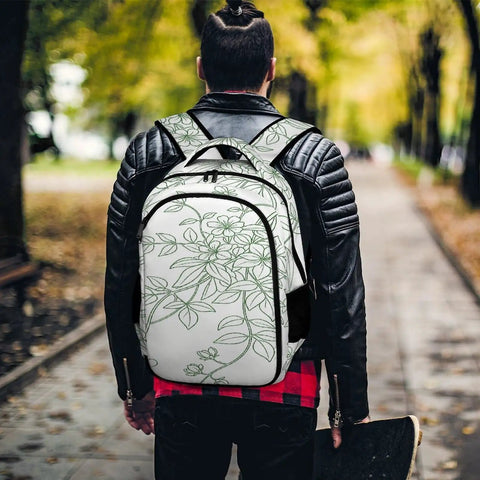 Person wearing Green Line Floral Vine Printed Unisex Backpack with large capacity and breathable mesh back for travel and school.