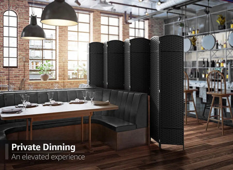 8 Panel Black Room Divider With Double Hinged Panels, 6 Ft Tall Folding Privacy Screen in restaurant setting