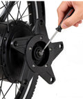 Mid Drive Spider Adapter Ring For 130BCD Aluminum Alloy Chainring Adapter Fits BBS01 BBS02 being installed on an ebike wheel