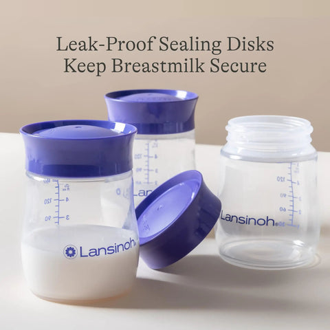 Soft Anti Colic Nipples For Everyday Bottle Feedings Paired With 5 Oz Breastmilk Storage Bottles In A Four Pack showing leak-proof sealing disks.