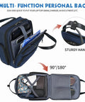 Open view of navy underseat carry on luggage for women, 16 inch lightweight overnight bag showing compartments and sturdy handle.