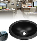 Real Deal Heavy Duty 304 Stainless Steel Round Tub Drain featuring a slick black coating and rock solid 40mm outlet in kitchen.