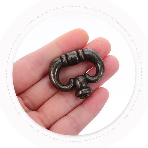 Vintage Zinc Alloy Single Hole Cabinet Pull Handles Set, Retro Style Drawer Hardware, shown in hand for size reference