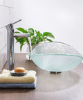 Contemporary USZWBY Bathroom Vessel Sink Vanity Tempered Glass Vessel Bowl Sink Oval Transparent on wooden countertop.