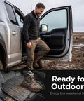 Man exiting a truck with Straight Up Hella Durable Floor Mats For Tesla Model Y Custom Snug Fit All Weather TPE Liners.