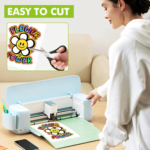 Person using Printable Heat Transfer Vinyl For Dark Fabric T Shirts 8.5 By 11 Inch Sheets Set Of 20 Iron On Transfer Paper
