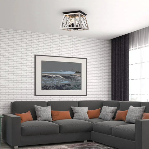Rustic Farmhouse Pendant Light Fixture With Open Cage Design, Matte Black 4 Light Industrial Chandelier in a modern living room