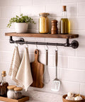 Kitchen shelf display using 10 Pack 1/2 In X 16 In Black Malleable Iron Pipe Nipples Fittings Set for DIY projects and decor.