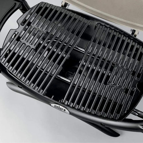 Top view of the Q1200 Portable Propane Grill For Travel And Camping Blue with 1 burner cast iron grates electronic ignition 8500 BTU