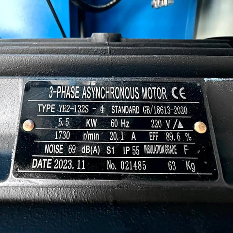 Label of 3-phase asynchronous motor detailing specifications, including power, voltage, and efficiency.