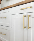 Champagne Bronze Cabinet Pulls 5 Inch Hole Centers Zinc Alloy Square Handles installed on white kitchen cabinets