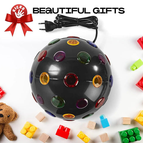 Spinning 11 Inch Disco Ball With LED Lights And 360 Degree Rotation for parties, surrounded by toys, plug visible