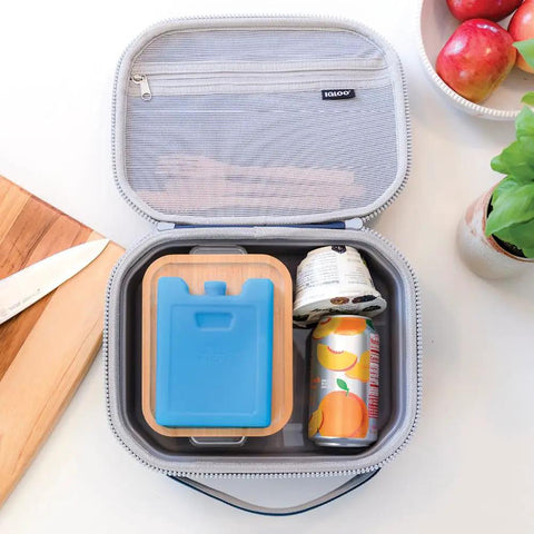 Lunch box containing Maxcold Ice Block Four Pack Reusable Freezable Gel Cooling Blocks for lunches beverages and meal prep.