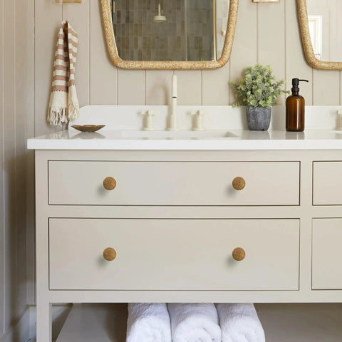 Bathroom vanity with Antique Brass Cabinet Knob Set 6 Pack Solid Zinc Alloy Drawer Pulls on white drawers