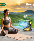 Woman meditating outdoors next to Solar Powered Camping Fan With Led Lantern 7W Panel 10400mAh Rechargeable Battery Quiet Outdoor Tent Fan For Picnic Barbecue Fishing And Travel Works While Charging