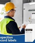 Worker using 500 Pack Inspection Record Labels for Safety Inspections, Equipment Maintenance, Quality Control, 5x3 inch tags.