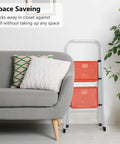 2 Step Folding Ladder With Handgrip, Heavy Duty Step Stool For Home And Kitchen next to gray sofa, compact fold, space-saving