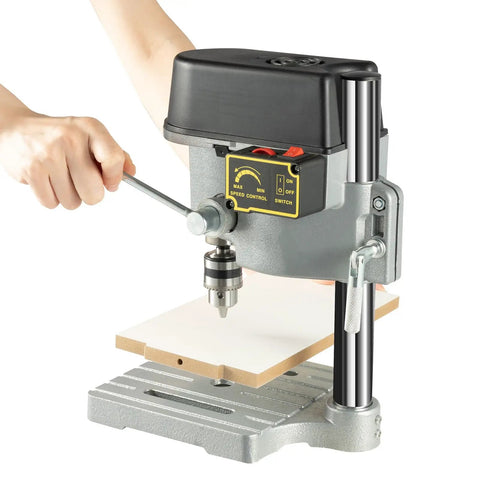 Chill Out On Craft Time With This Tough Little Benchtop Drill Press Featuring A Reliable 340W Motor And Snappy Three Speed Controls. Compact drill press in use with adjustable speed settings.