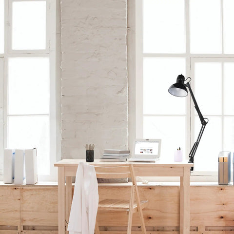 32 Inch Swing Arm Clamp On Desk Lamp Black Finish With LED Bulb Included mounted on desk in bright room