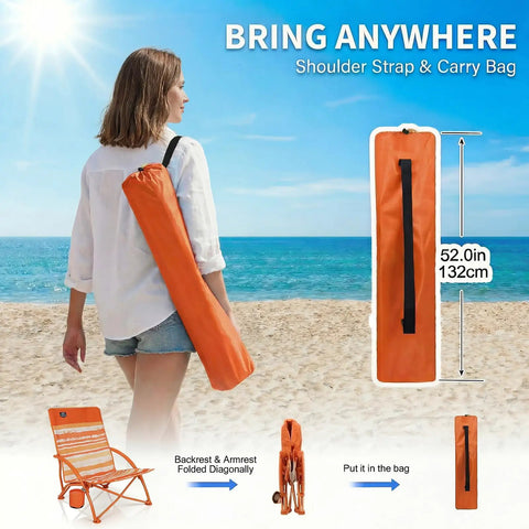 Woman carrying orange bag for Two Pack Low Beach Chairs For Adults Folding Recliner Camping Chairs on a beach.