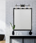 Inwood 4 Light Bathroom Vanity Light Fixture in Chrome With Blown Clear Glass Shades above mirror in modern bathroom